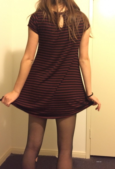 posing taking off tights and dress