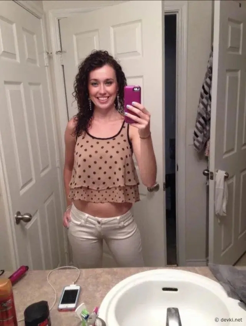 Smiling Brunette Strips Naked in Front of Mirror, Explicit Nude Photos