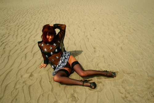 Sweet curvy MILF teasing you with a naughty smile