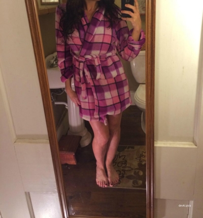 Homemade erotica of a brunette in a bathrobe