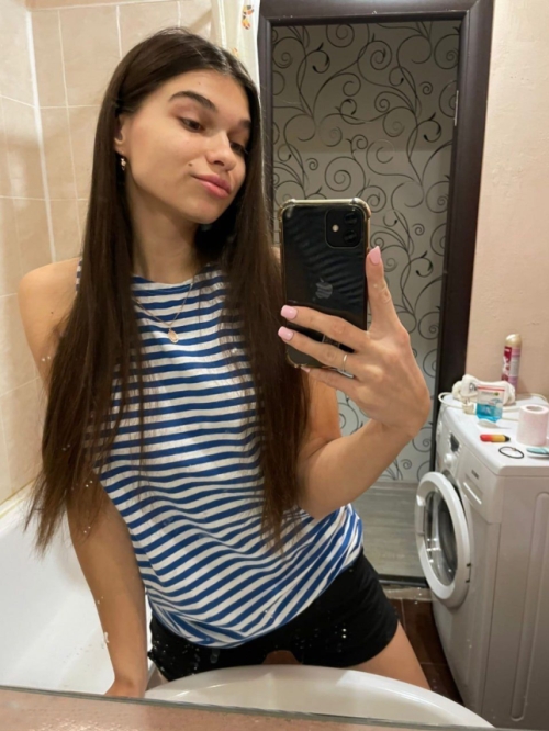 Young girl flaunts her beautiful breasts