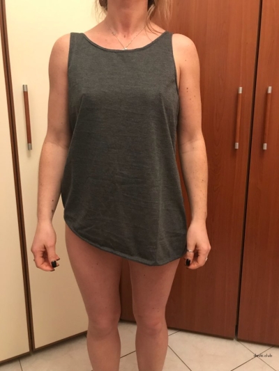 Woman without panties trying on clothes