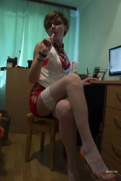 Slender Girl in Glasses Gets Explicit in Hot Porn Photo