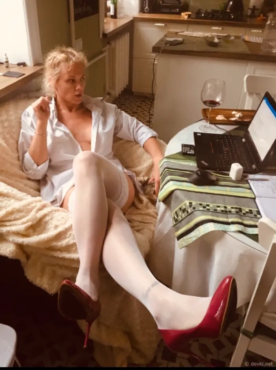 Masha remotely in stockings and naked