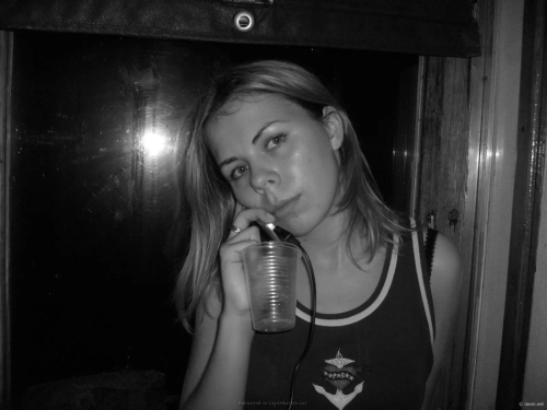 Topless Beach Babe: Explicit Sunbathing and Sensual Relaxation