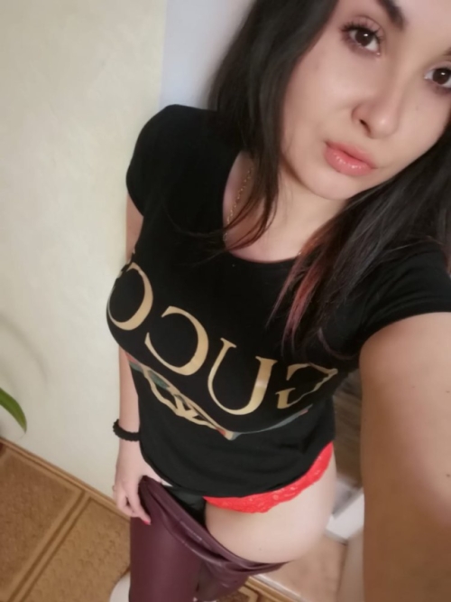 Beautiful Busty Young MILF Erotically Poses in Red Lingerie Showing Her Pussy