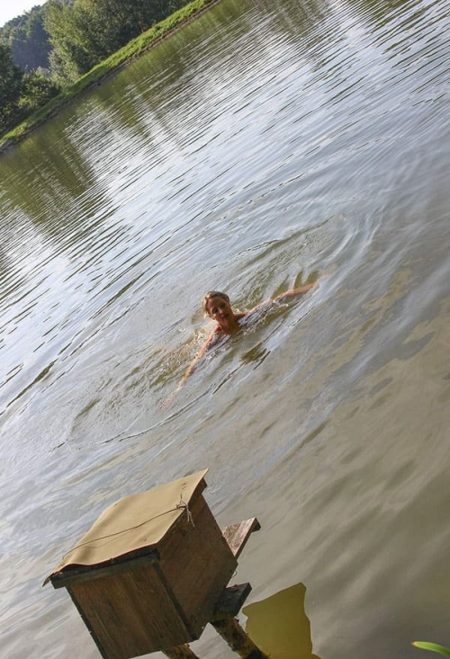 Topless Girl Jumping Off Tarzan Swing: Wild and Carefree Fun!