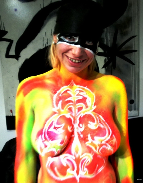 Provocative Home Body Art: Sensual Nude Woman Painted in Intimate Setting