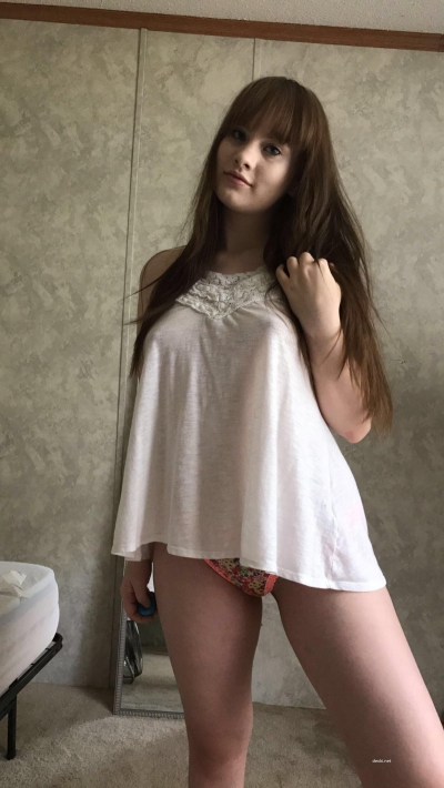 Posing in a nightie and thong