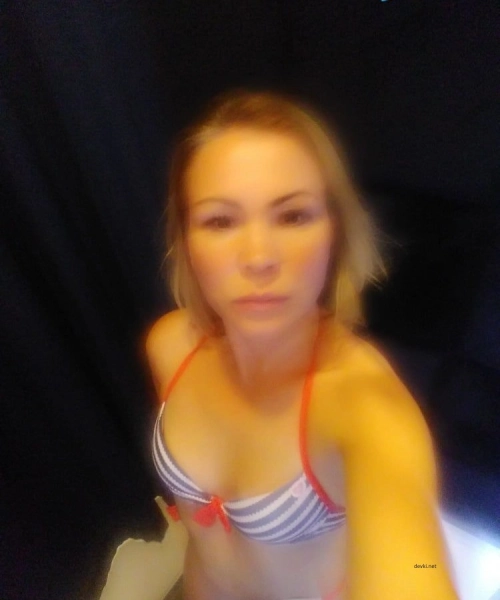 Sexy MILF Takes Selfie in Fitting Room - Explicit Mature Woman Photo