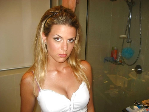 Sucking off her boyfriend in explicit blowjob photo