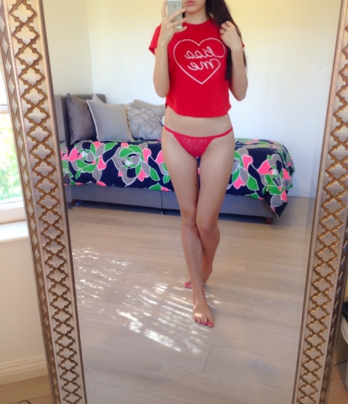 Girl posing and masturbating in front of mirror