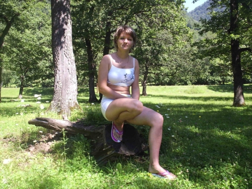 Seductive Lady Flaunts All Her Assets Without Any Frills