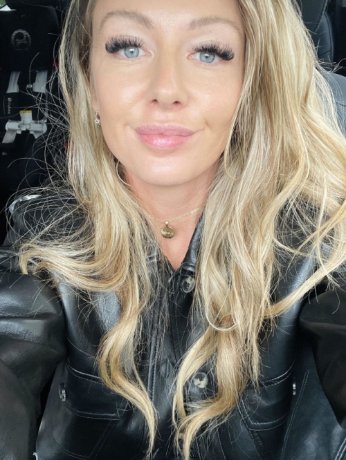 Busty Blonde Flaunts Sexy Curves and Assets