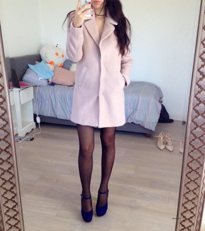 Brunette in a coat and stockings