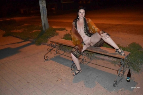 Brunette Strips on the Beach: Explicit Nude Photoshoot