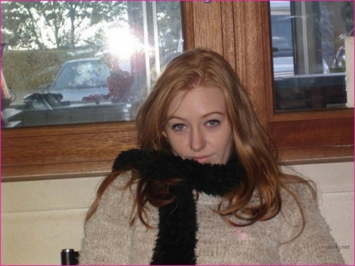 Redhead babe deepthroats cock - Explicit blowjob photo