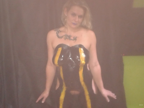 Provocative Home Body Art: Sensual Nude Woman Painted in Intimate Setting