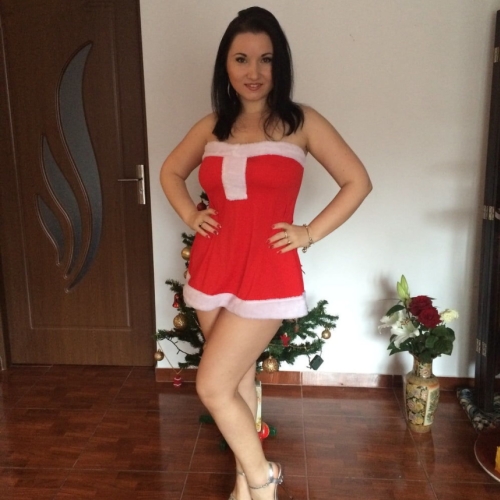 Woman in New Year's costume performs explicit striptease show