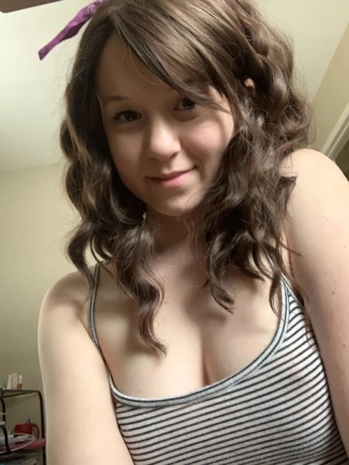 Sizzling Photos of Young Woman Showing Off Her Pussy