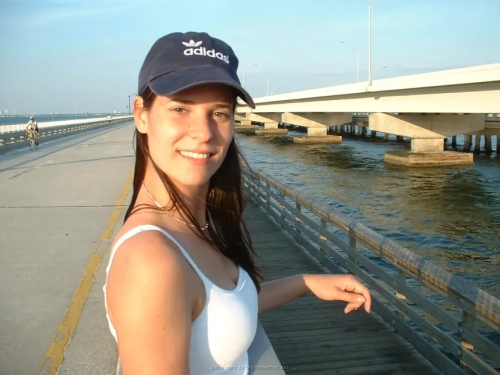 Guy Cums on Beautiful Girl's Face in Hot Porn Photo