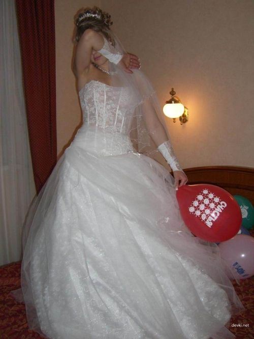 Sexy Bride Reveals Shaved Pussy in Explicit Wedding Photoshoot