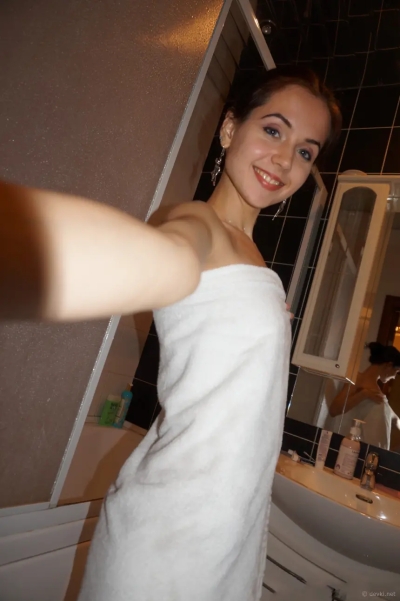 Cute brunette loves to pose naked