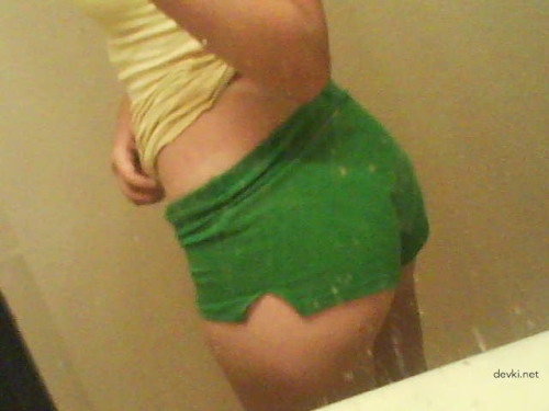 Explicit Nude Photo: Sensual Woman Posing Seductively in Black Lingerie