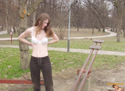 The girl undressed in the park