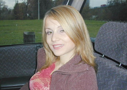 Wife Inserts Anal Toy in Car - Explicit Amateur Porn Photo