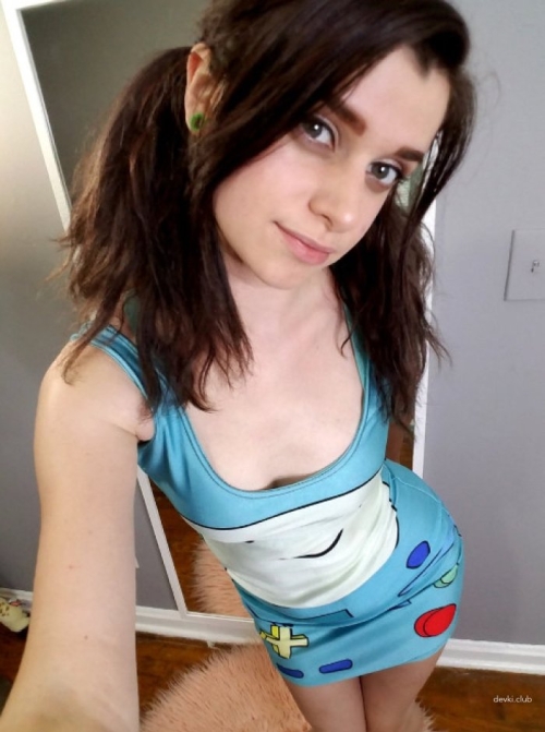 Busty Beauty Flaunts Her Breasts in Sultry Display