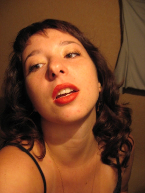 Sensual Woman Posing as Fierce Lioness in Steamy Photoshoot