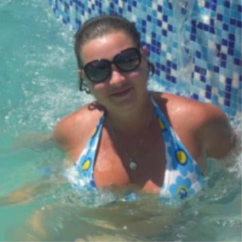 Whore Poses and Shows Off Her Toys in Hardcore Porn Shoot