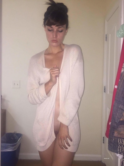 Sexy brunette in a white robe