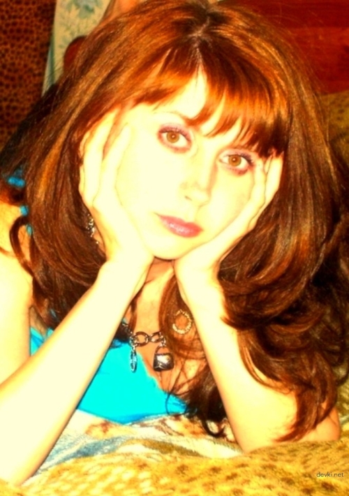 Redhead Poses Nude and Deepthroats Cock in Explicit Porn Photo