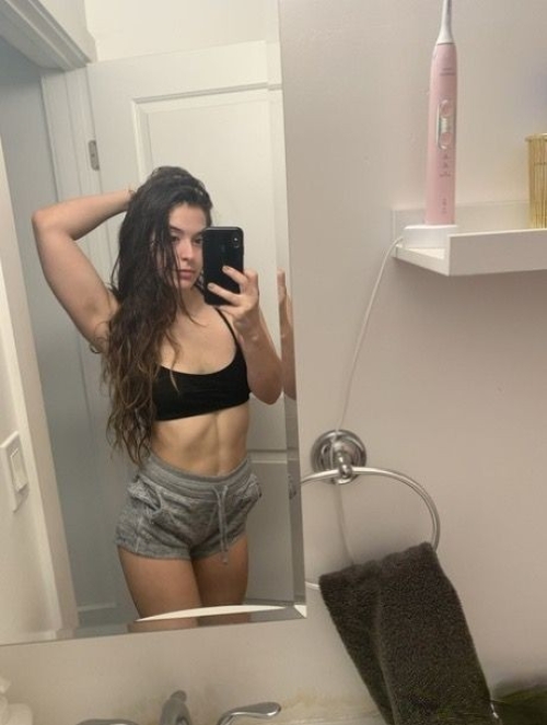 Young Brunette Selfies Exposing Holes and Hot Body on Smartphone