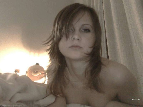 Hot babe flaunts her wet pussy - Explicit close-up photo