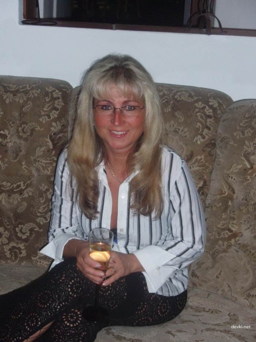 Mature babe strips and sucks cock - Explicit MILF porn photo