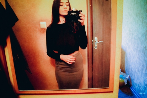 Provocative display of bare breasts - Bold and explicit photo