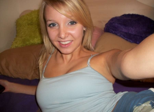 Sexy Tattooed Girl with Piercings Shows Off in Provocative Display