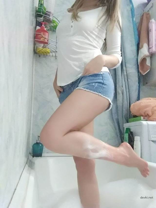 Gorgeous girl takes a bath