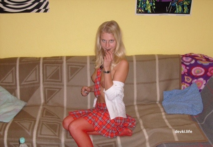 Student posing at home without panties under her skirt