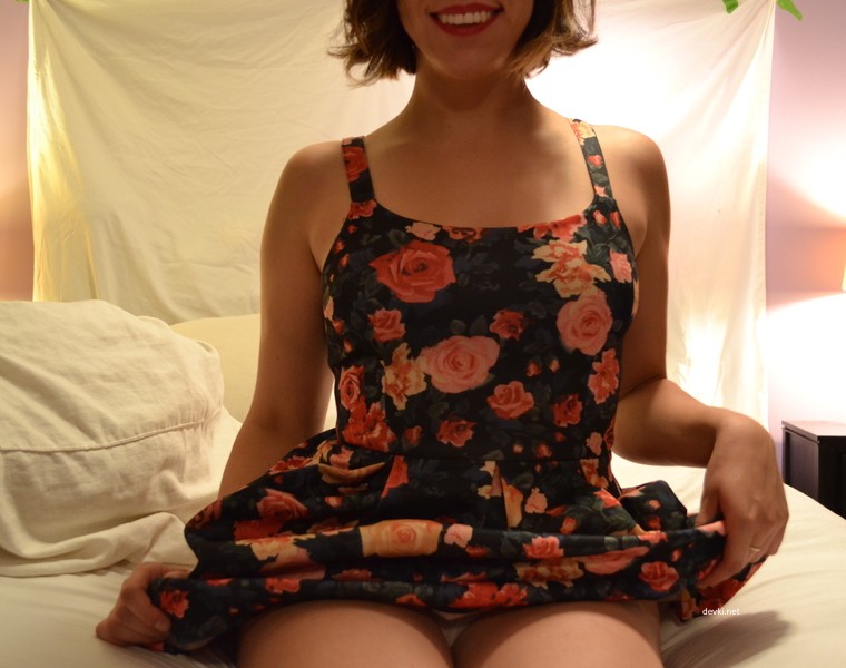 Posing in a dress with flowers